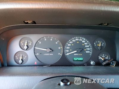 Zdjęcie 9 z 13 samochodu: 2004 JEEP GRAND CHEROKEE LAREDO VIN:1J4GW48S74C424140 - miniatura