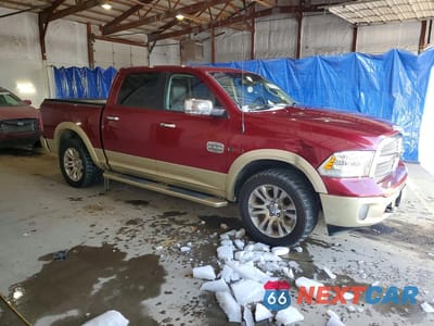 Czwarte zdjęcie samochodu z boku: 2015 RAM 1500 LONGHORN VIN:1C6RR7PM6FS555070 - miniatura
