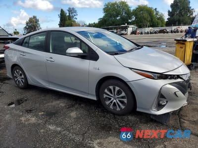 Czwarte zdjęcie samochodu z boku: 2022 TOYOTA PRIUS PRIME LE VIN:JTDKAMFP8N3214032 - miniatura