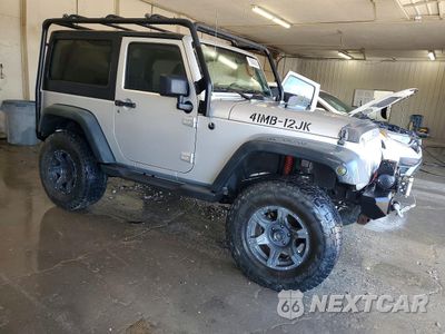 Czwarte zdjęcie samochodu z boku: 2012 JEEP WRANGLER SPORT VIN:1C4AJWAGXCL244550 - miniatura