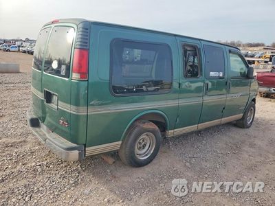 Trzecie zdjęcie samochodu z tyłu: 1999 GMC SAVANA RV G1500 VIN:1GDFG15R7X1059386 - miniatura