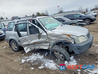 Czwarte zdjęcie samochodu z boku: 1999 HONDA CR-V EX VIN:JHLRD1868XC077186 - miniatura