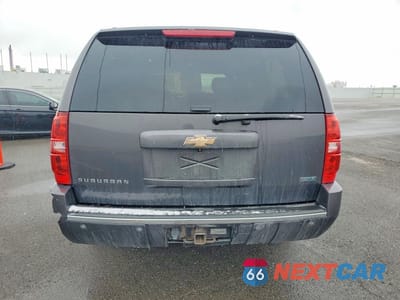 Piąte zdjęcie samochodu w środku: 2010 CHEVROLET SUBURBAN K1500 LTZ VIN:1GNUKKE39AR186359 - miniatura