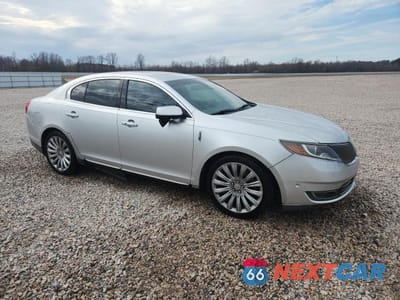 Czwarte zdjęcie samochodu z boku: 2013 LINCOLN MKS VIN:1LNHL9DK4DG602614 - miniatura