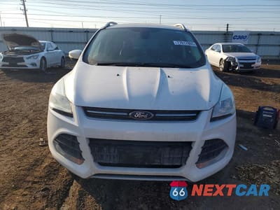 Piąte zdjęcie samochodu w środku: 2014 FORD ESCAPE TITANIUM VIN:1FMCU0JX4EUD43208 - miniatura