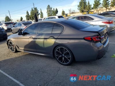 Drugie zdjęcie samochodu z przodu: 2022 BMW M550XI VIN:WBA13BK04NCJ54220 - miniatura