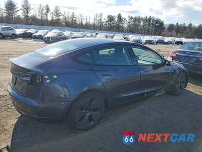 Trzecie zdjęcie samochodu z tyłu: 2023 TESLA MODEL 3 VIN:5YJ3E1EA9PF679672 - miniatura