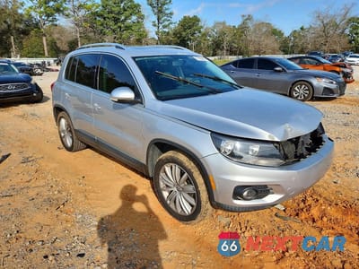 Czwarte zdjęcie samochodu z boku: 2014 VOLKSWAGEN TIGUAN S VIN:WVGAV3AX3EW568181 - miniatura