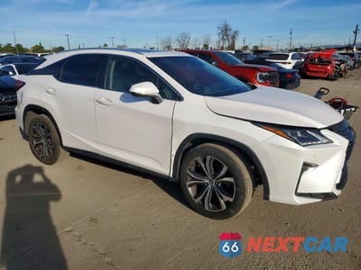 Czwarte zdjęcie samochodu z boku: 2019 LEXUS RX 350 BASE VIN:2T2ZZMCA4KC124107 - miniatura
