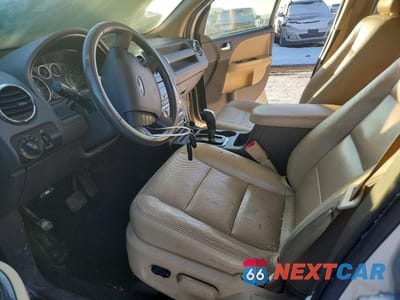 Zdjęcie 7 z 12 samochodu: 2008 FORD TAURUS X SEL VIN:1FMDK05W08GA04282 - miniatura