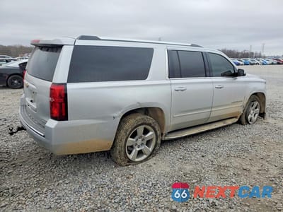 Trzecie zdjęcie samochodu z tyłu: 2020 CHEVROLET SUBURBAN C1500 PREMIER VIN:1GNSCJKC0LR213146 - miniatura
