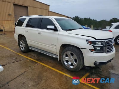 Czwarte zdjęcie samochodu z boku: 2015 CHEVROLET TAHOE C1500 LTZ VIN:1GNSCCKC9FR212089 - miniatura