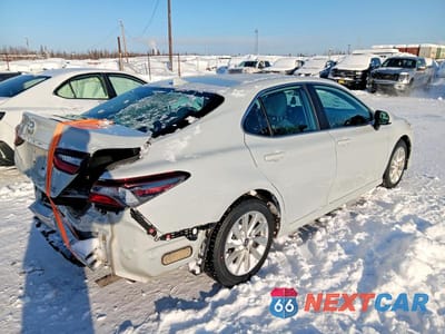 Trzecie zdjęcie samochodu z tyłu: 2022 TOYOTA CAMRY LE VIN:4T1C11BK0NU065666 - miniatura
