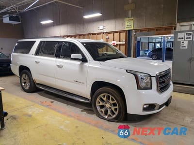 Czwarte zdjęcie samochodu z boku: 2015 GMC YUKON XL K1500 SLT VIN:1GKS2HKC9FR551335 - miniatura