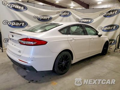 Trzecie zdjęcie samochodu z tyłu: 2020 FORD FUSION SE VIN:3FA6P0HD3LR230686 - miniatura