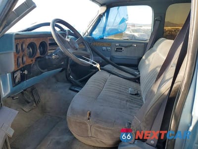 Zdjęcie 7 z 14 samochodu: 1990 CHEVROLET SUBURBAN V2500 VIN:1GNGV26K7LF119614 - miniatura