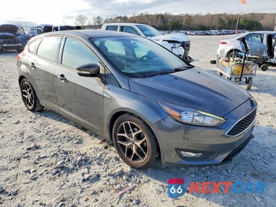 Czwarte zdjęcie samochodu z boku: 2017 FORD FOCUS SEL VIN:1FADP3M2XHL311767 - miniatura
