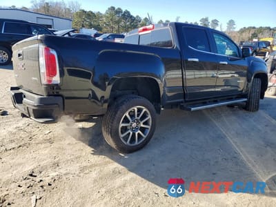 Trzecie zdjęcie samochodu z tyłu: 2019 GMC CANYON DENALI VIN:1GTG6EEN9K1315374 - miniatura