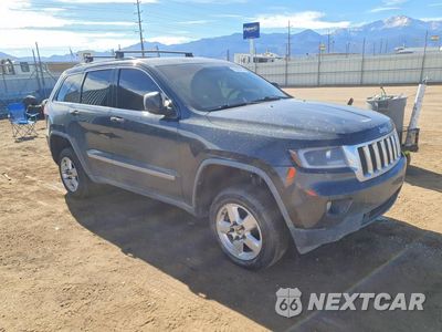 Czwarte zdjęcie samochodu z boku: 2011 JEEP GRAND CHEROKEE LAREDO VIN:1J4RR4GG9BC585888 - miniatura