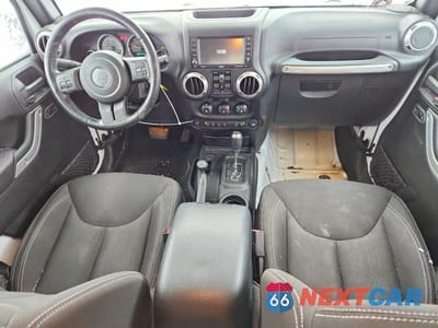 Zdjęcie 8 z 12 samochodu: 2016 JEEP WRANGLER UNLIMITED SAHARA VIN:1C4BJWEG8GL326992 - miniatura