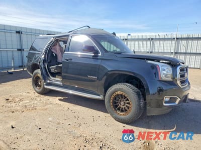 Czwarte zdjęcie samochodu z boku: 2018 GMC YUKON SLE VIN:1GKS1AKC5JR101278 - miniatura