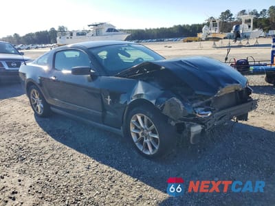 Czwarte zdjęcie samochodu z boku: 2011 FORD MUSTANG VIN:1ZVBP8AM5B5118763 - miniatura