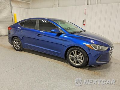 Czwarte zdjęcie samochodu z boku: 2017 HYUNDAI ELANTRA SE VIN:5NPD84LF7HH046649 - miniatura