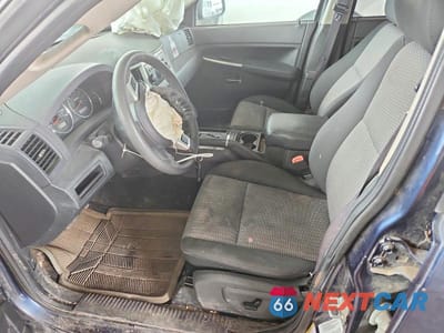 Zdjęcie 7 z 12 samochodu: 2009 JEEP GRAND CHEROKEE LAREDO VIN:1J8GR48K89C552089 - miniatura