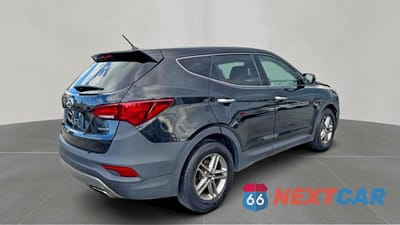 Czwarte zdjęcie samochodu z boku: 2018 HYUNDAI SANTA FE SPORT VIN:5NMZT3LB0JH081161 - miniatura