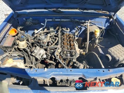 Zdjęcie 11 z 12 samochodu: 1999 NISSAN FRONTIER KING CAB XE VIN:1N6DD26S0XC337316 - miniatura