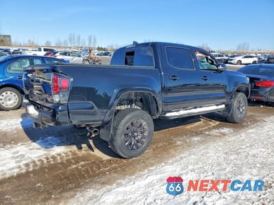 Trzecie zdjęcie samochodu z tyłu: 2021 TOYOTA TACOMA DOUBLE CAB VIN:3TYGZ5AN1MT014637 - miniatura