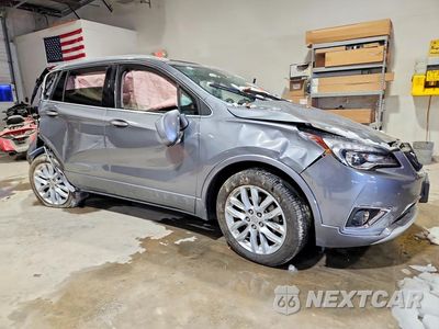 Czwarte zdjęcie samochodu z boku: 2019 BUICK ENVISION PREMIUM II VIN:LRBFX4SX4KD002819 - miniatura