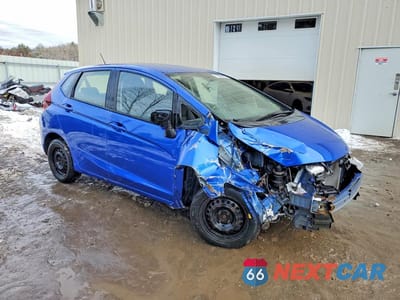 Czwarte zdjęcie samochodu z boku: 2016 HONDA FIT LX VIN:JHMGK5H54GX032651 - miniatura