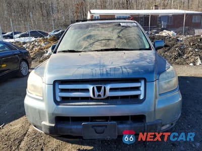 Piąte zdjęcie samochodu w środku: 2006 HONDA PILOT EX VIN:2HKYF18606H515611 - miniatura
