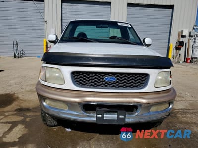 Piąte zdjęcie samochodu w środku: 1997 FORD F150 VIN:1FTDF18W3VNA65711 - miniatura