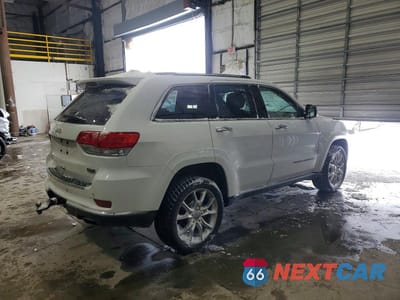 Trzecie zdjęcie samochodu z tyłu: 2015 JEEP GRAND CHEROKEE SUMMIT VIN:1C4RJFJM2FC797299 - miniatura