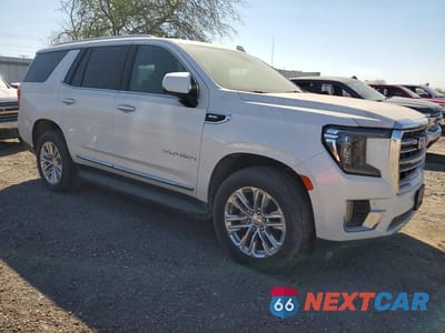 Czwarte zdjęcie samochodu z boku: 2021 GMC YUKON SLT VIN:1GKS2BKD8MR122464 - miniatura