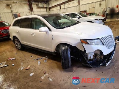 Czwarte zdjęcie samochodu z boku: 2012 LINCOLN MKT VIN:2LMHJ5AT3CBL54801 - miniatura