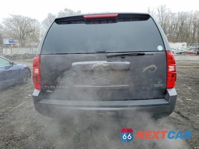 Zdjęcie 6 z 12 samochodu: 2010 CHEVROLET SUBURBAN K1500 LS VIN:1GNUKHE37AR148650 - miniatura
