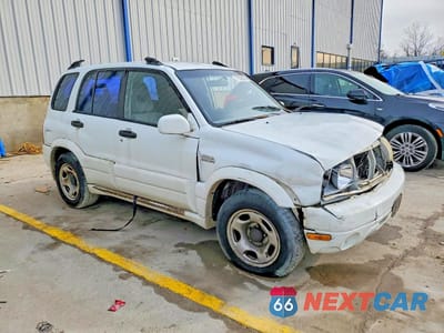 Czwarte zdjęcie samochodu z boku: 2001 SUZUKI GRAND VITARA JX VIN:JS3TD62V414154686 - miniatura