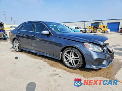 Czwarte zdjęcie samochodu z boku: 2014 MERCEDES-BENZ E 350 VIN:WDDHF5KB7EA967600 - miniatura