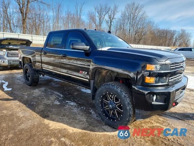 Czwarte zdjęcie samochodu z boku: 2016 CHEVROLET SILVERADO VIN:1GC1KWEGXGF254720 - miniatura