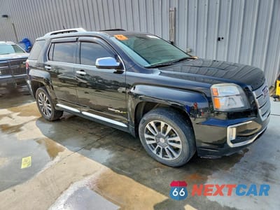 Czwarte zdjęcie samochodu z boku: 2016 GMC TERRAIN DENALI VIN:2GKFLRE31G6132960 - miniatura