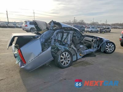 Trzecie zdjęcie samochodu z tyłu: 2006 CADILLAC DTS VIN:1G6KD57Y06U119516 - miniatura