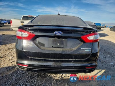 Zdjęcie 6 z 12 samochodu: 2016 FORD FUSION TITANIUM VIN:3FA6P0D9XGR235892 - miniatura