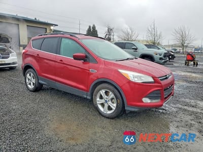 Czwarte zdjęcie samochodu z boku: 2014 FORD ESCAPE SE VIN:1FMCU0G90EUB48246 - miniatura