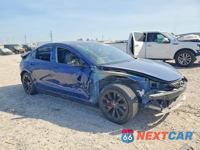 Czwarte zdjęcie samochodu z boku: 2021 TESLA MODEL 3 VIN:5YJ3E1EA4MF060716 - miniatura