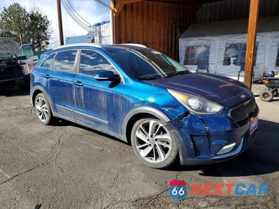 Czwarte zdjęcie samochodu z boku: 2017 KIA NIRO TOURING VIN:KNDCE3LC4H5051120 - miniatura