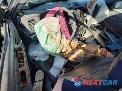 Zdjęcie 8 z 11 samochodu: 2001 KIA OPTIMA MAGENTIS VIN:KNAGD124515098534 - miniatura