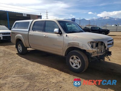 Czwarte zdjęcie samochodu z boku: 2004 TOYOTA TUNDRA DOUBLE CAB SR5 VIN:5TBDT44154S456784 - miniatura